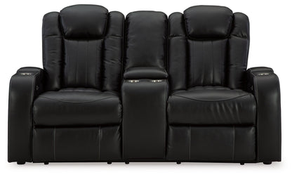 Caveman Den - Power Reclining Loveseat with Console/ Adj Hdrst - Midnight